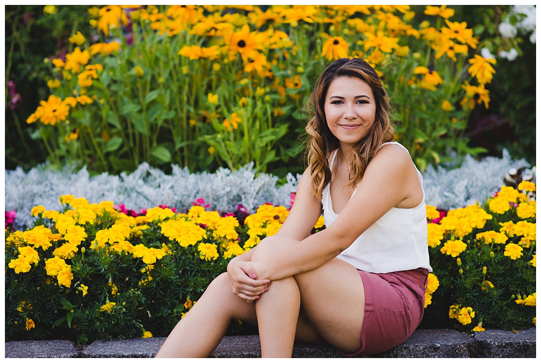 Summery Senior Portraits with Yellow Flowers, Casual Outfit photographed by Tacoma Senior Photographer Amanda Howse