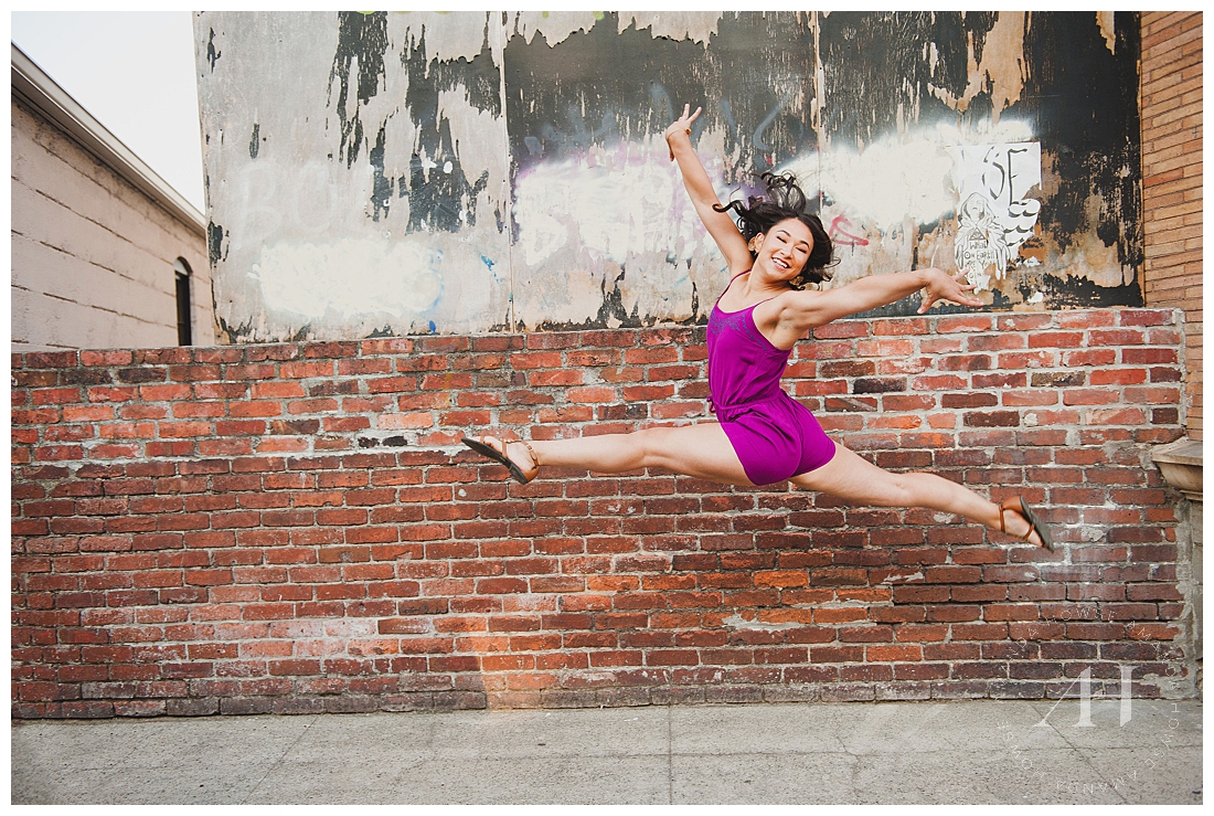 Gymnast Senior Portraits in Tacoma with Leaping Pose in Purple Romper photographed by Tacoma Senior Photographer Amanda Howse