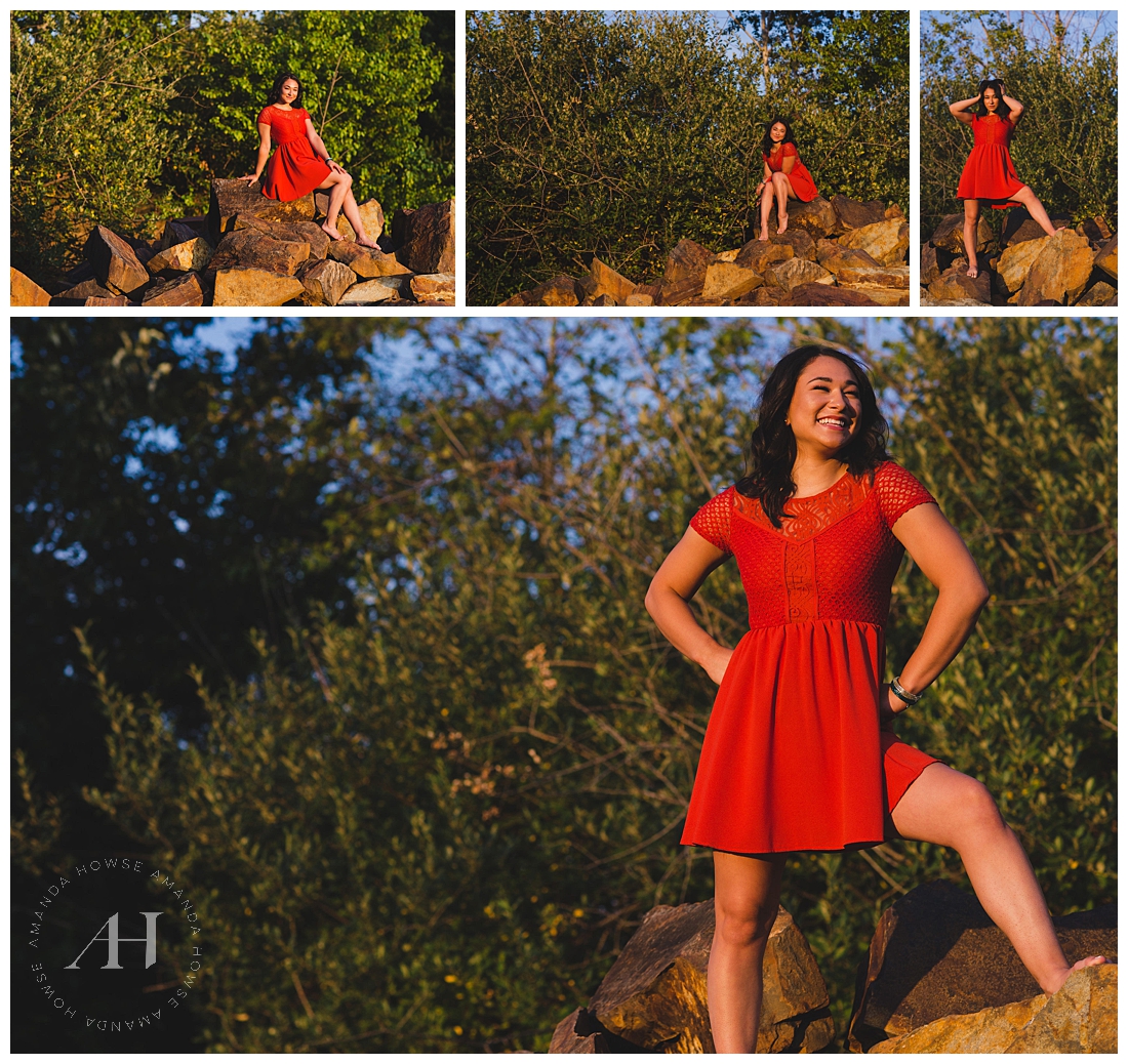 Powerful Senior Portraits with Girl Power photographed on boulders with red dress by Amanda Howse Photography