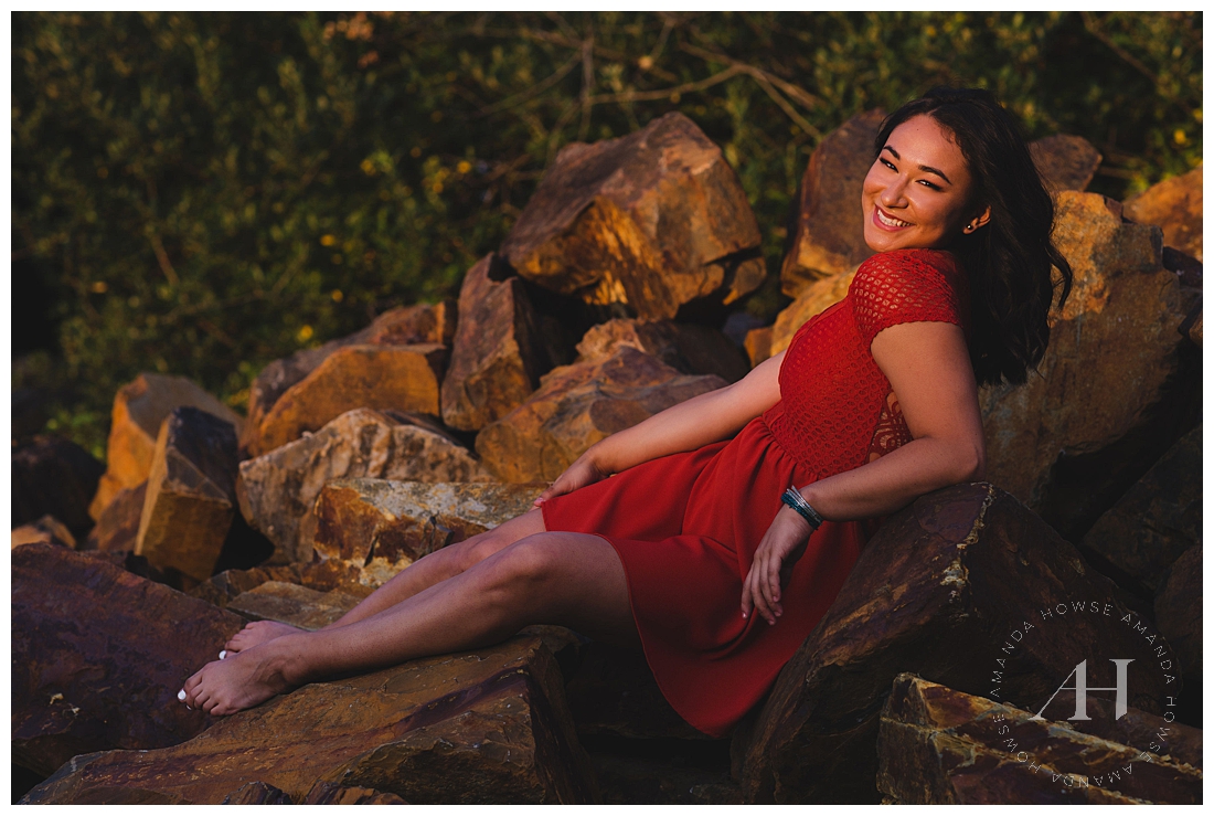 Senior Portraits with a bold orange dress in downtown Tacoma photographed by senior photographer Amanda Howse