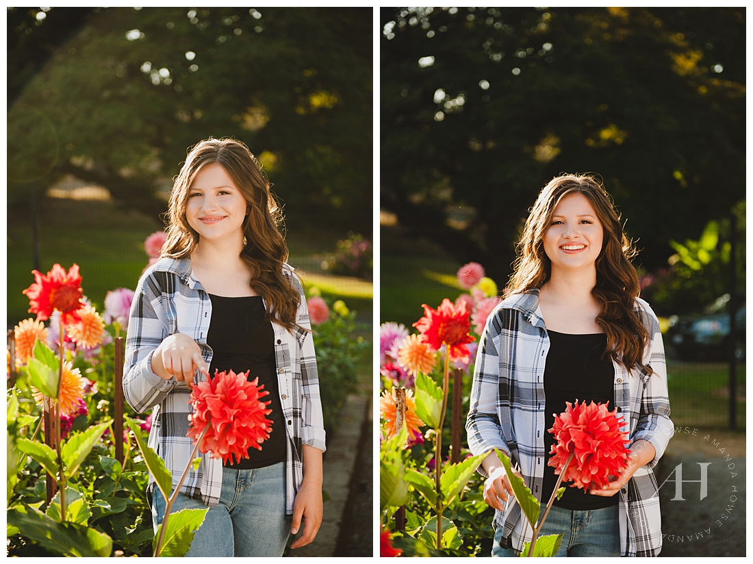 High school senior portraits in a garden with blooming flowers photographed by Tacoma senior photographer Amanda Howse