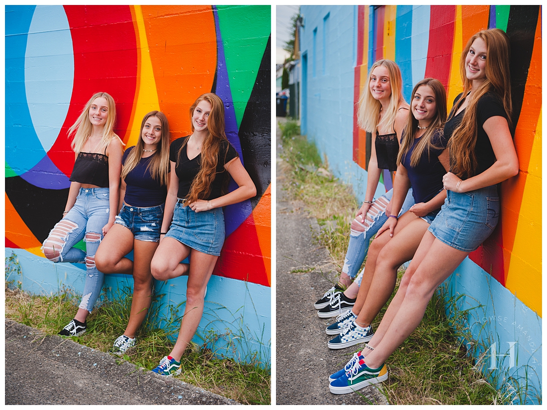 AHP Model Team reps leaning against the Tacoma Love Mural with casual outfits on | Photographed by Tacoma Senior Photographer Amanda Howse
