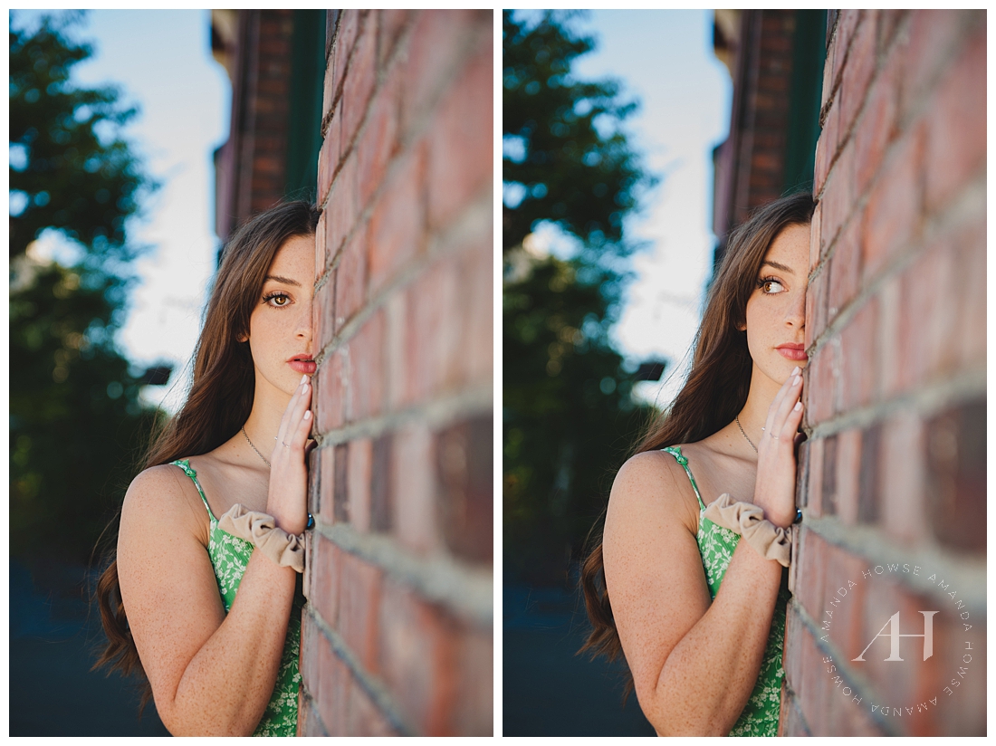 Modern Senior Portraits in Downtown Tacoma | Close Portrait of Senior Girl by Brick Wall | Photographed by the Best Tacoma Senior Portrait Photographer Amanda Howse
