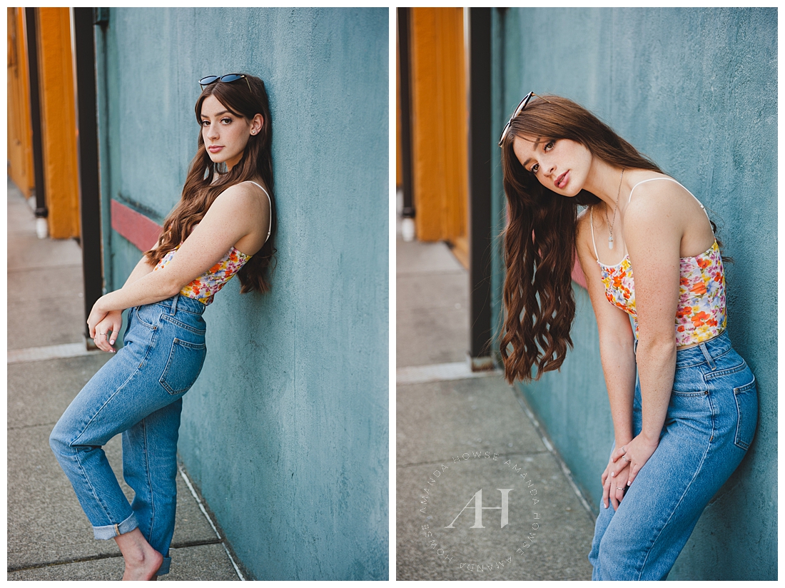 Pose Ideas for Senior Portraits | High School Senior Girl Posing Against Colorful Tacoma Wall for Urban Senior Portraits | Photographed by the Best Tacoma Senior Portrait Photographer Amanda Howse
