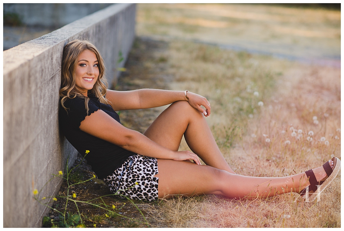 Senior Portraits by a Concrete Wall | How to Pose for Outdoor Senior Portraits | Photographed by the Best Tacoma Senior Photographer Amanda Howse