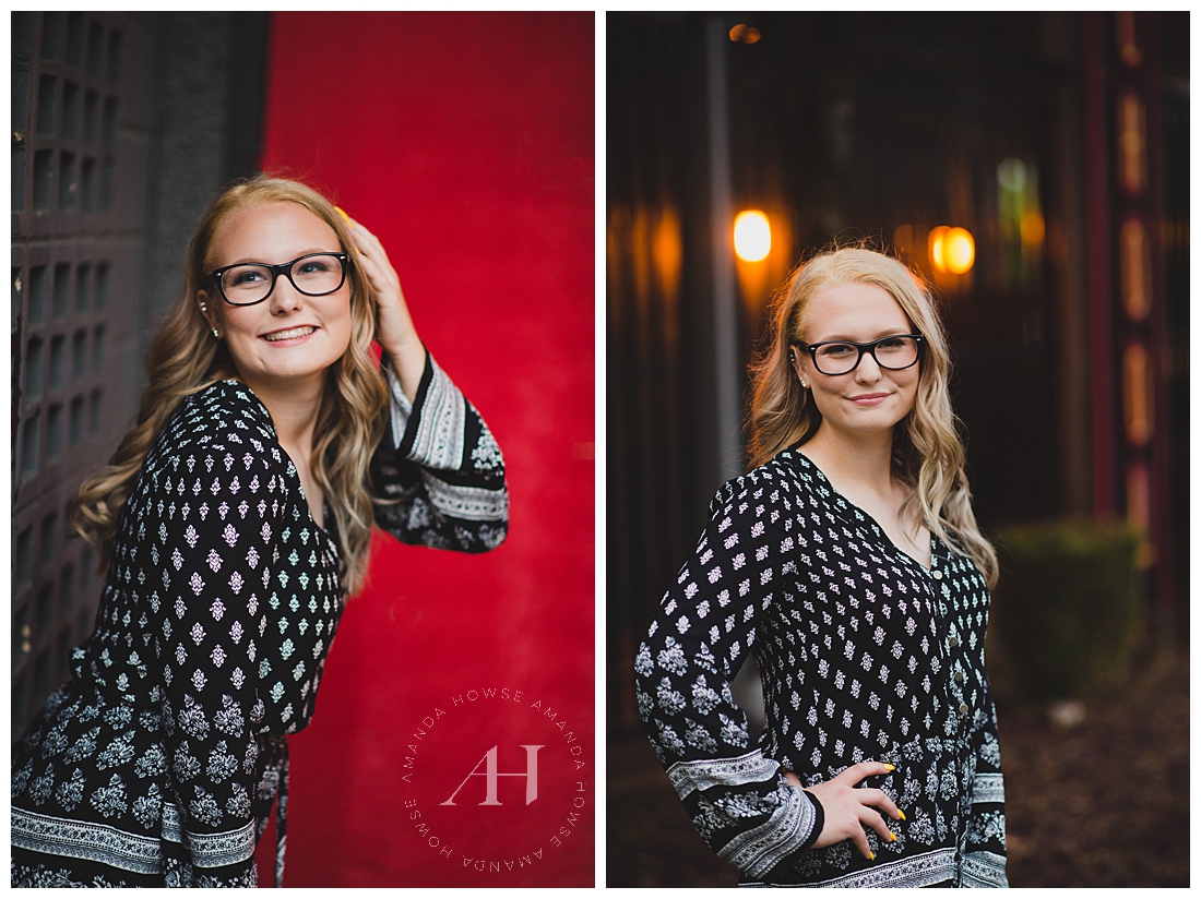 Cute Senior Portraits in Downtown Tukwila with Red Wall | Outfit Ideas for Senior Portraits, How to Style a Romper, Senior Portraits with Glasses | Photographed by the Best Tacoma Senior Portrait Photographer Amanda Howse Photography 